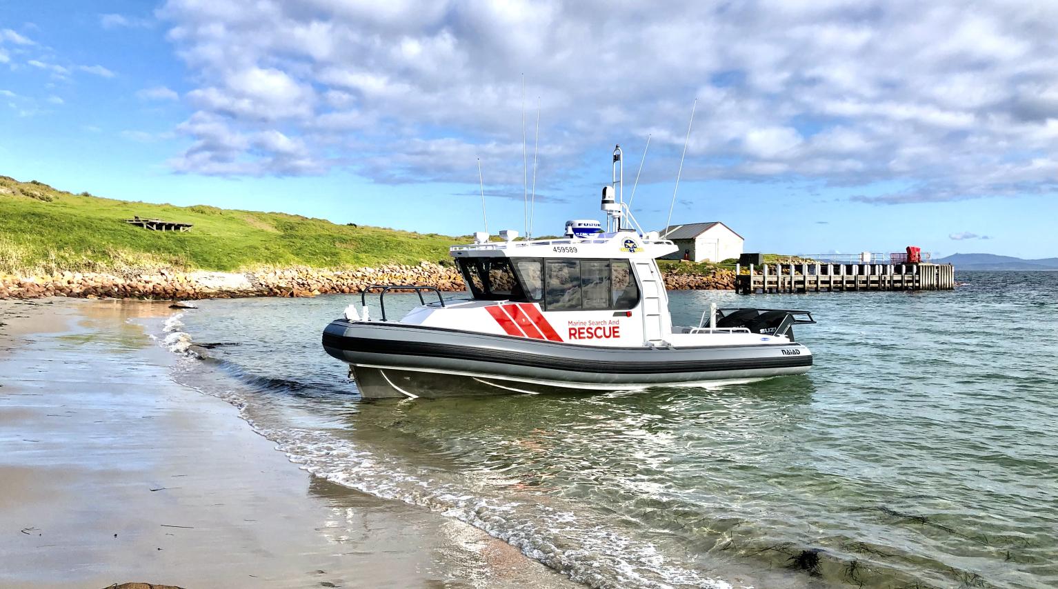 Marine Search and Rescue vessel by the shore