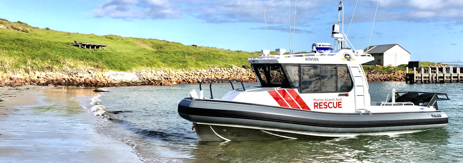 A Marine Search and Rescue vessel by the beach in Mallacoota